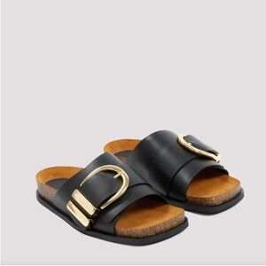 KHAITE Black Sandals with Gold Buckles